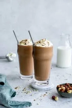 A tall glass of Nutella milkshake
